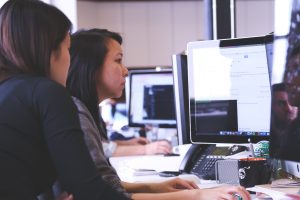 women looking at laptop