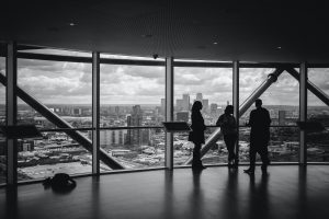 Three people meeting in an office building