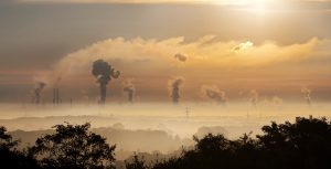 smoke stacks on the horizon